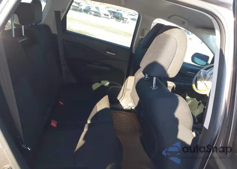 2015 Honda Cr-V Lx z USA, uszkodzony, nr VIN 3CZRM3H30FG707688